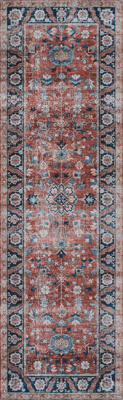 Persian-style runner rug with orange-red field, navy border and blue/ivory floral medallions; distressed vintage look.