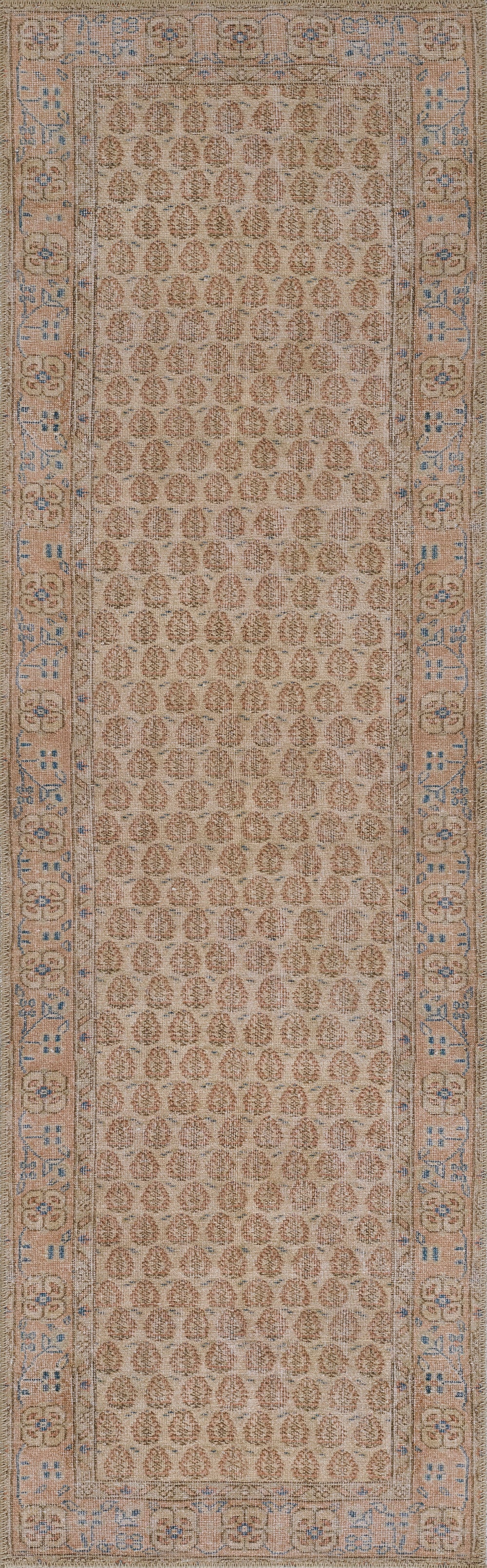 Rectangular beige oriental rug with repeating oval medallions and an ornate blue-gray border; Persian-inspired design.