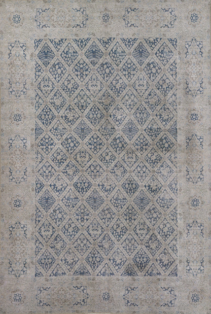 Blue and beige distressed oriental area rug with diamond lattice pattern and floral border.