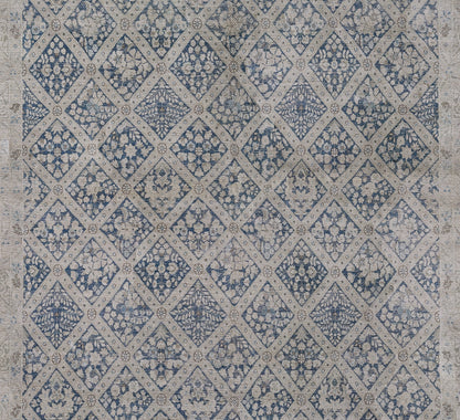 Blue-beige diamond lattice rug with floral medallion clusters; woven textile for boho or traditional home decor.