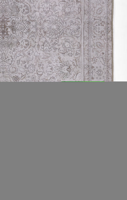 Gray Oriental-style rug with delicate floral damask pattern and a narrow decorative border.