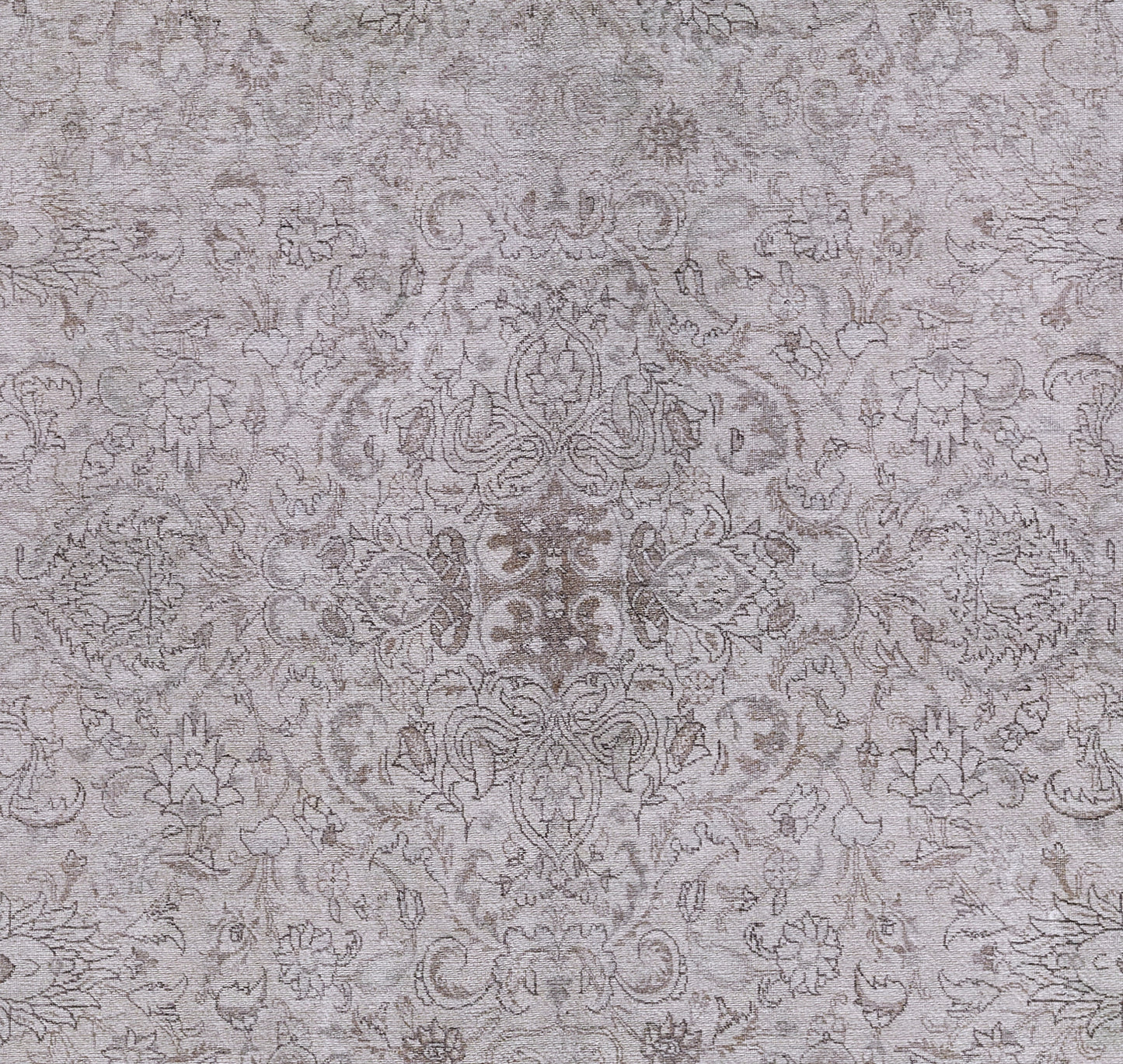 Gray damask patterned area rug with ornate floral medallion design and subtle texture.