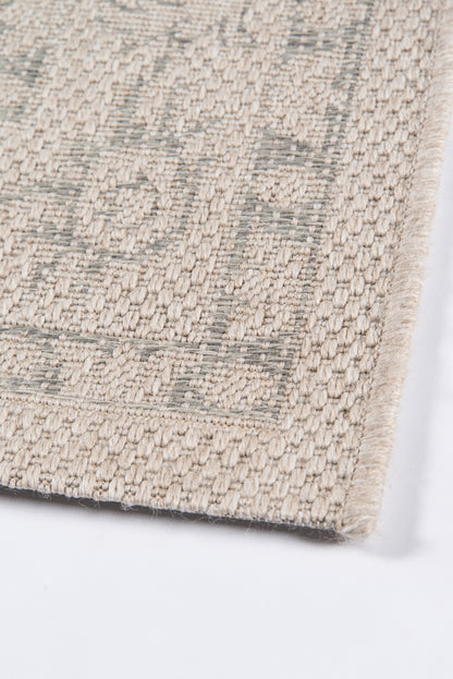 Beige and gray woven runner rug with a geometric border and dense looped texture; neutral home decor.
