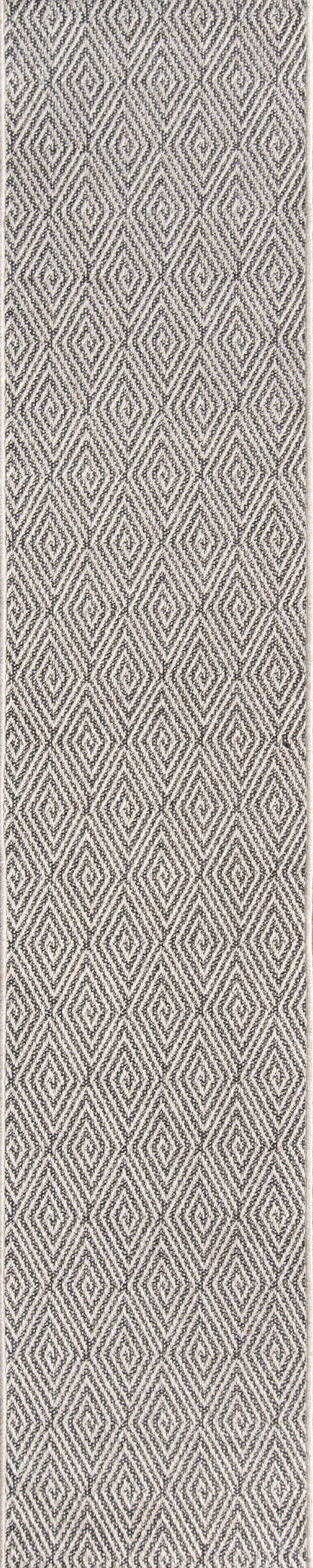 Geometric diamond lattice rug in beige-gray tones; woven, ideal for upholstery or decor accents.