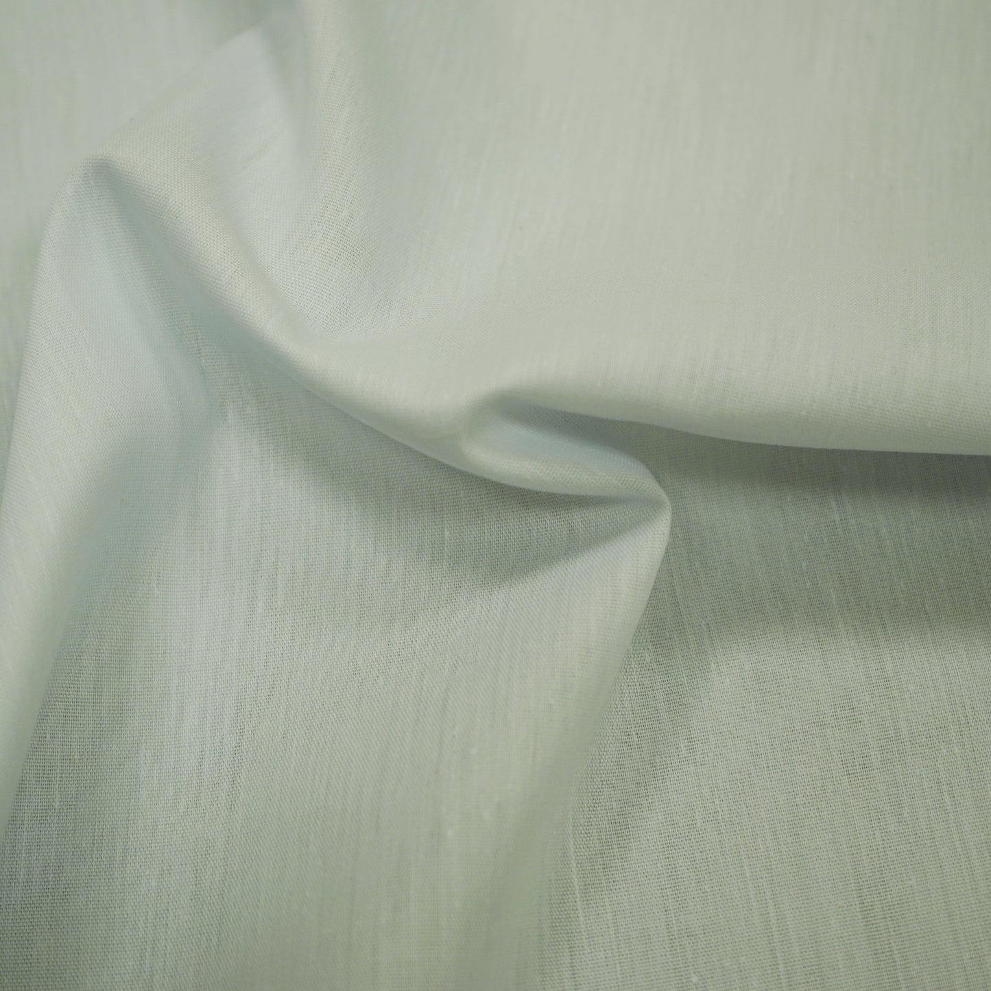 Plain off-white lining fabric with a soft drape and visible weave texture.