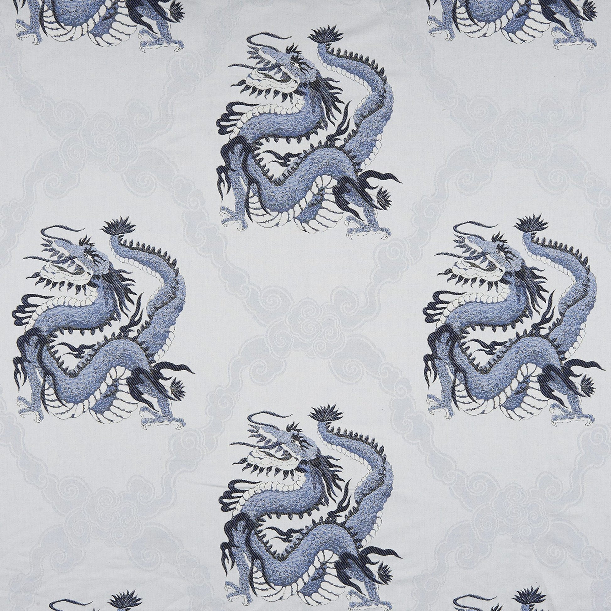Repeating blue dragon motif on a pale gray background with subtle cloud scrolls; Jacquard fabric design.