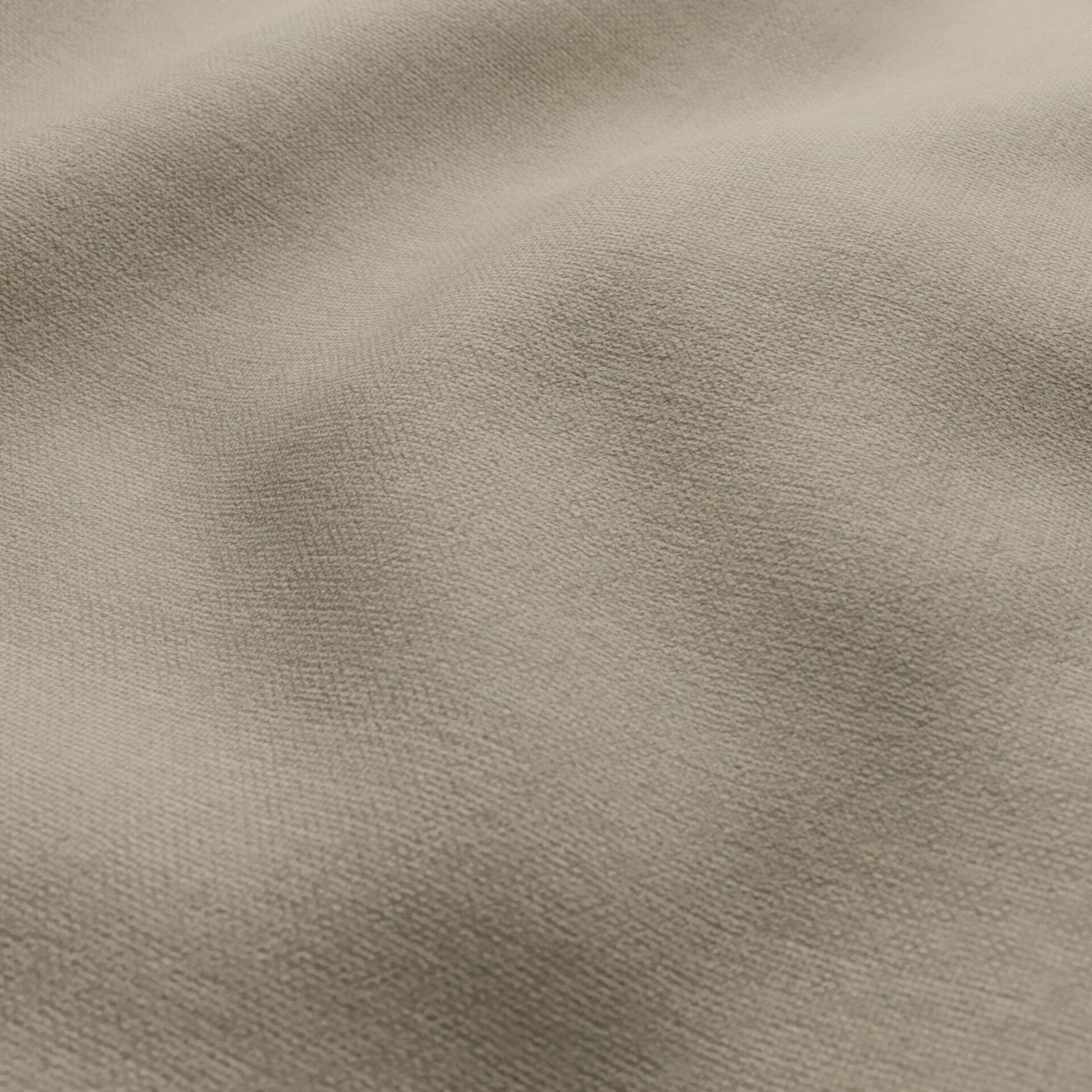 Beige textured fabric with soft folds and subtle weave, neutral drape for apparel or upholstery.