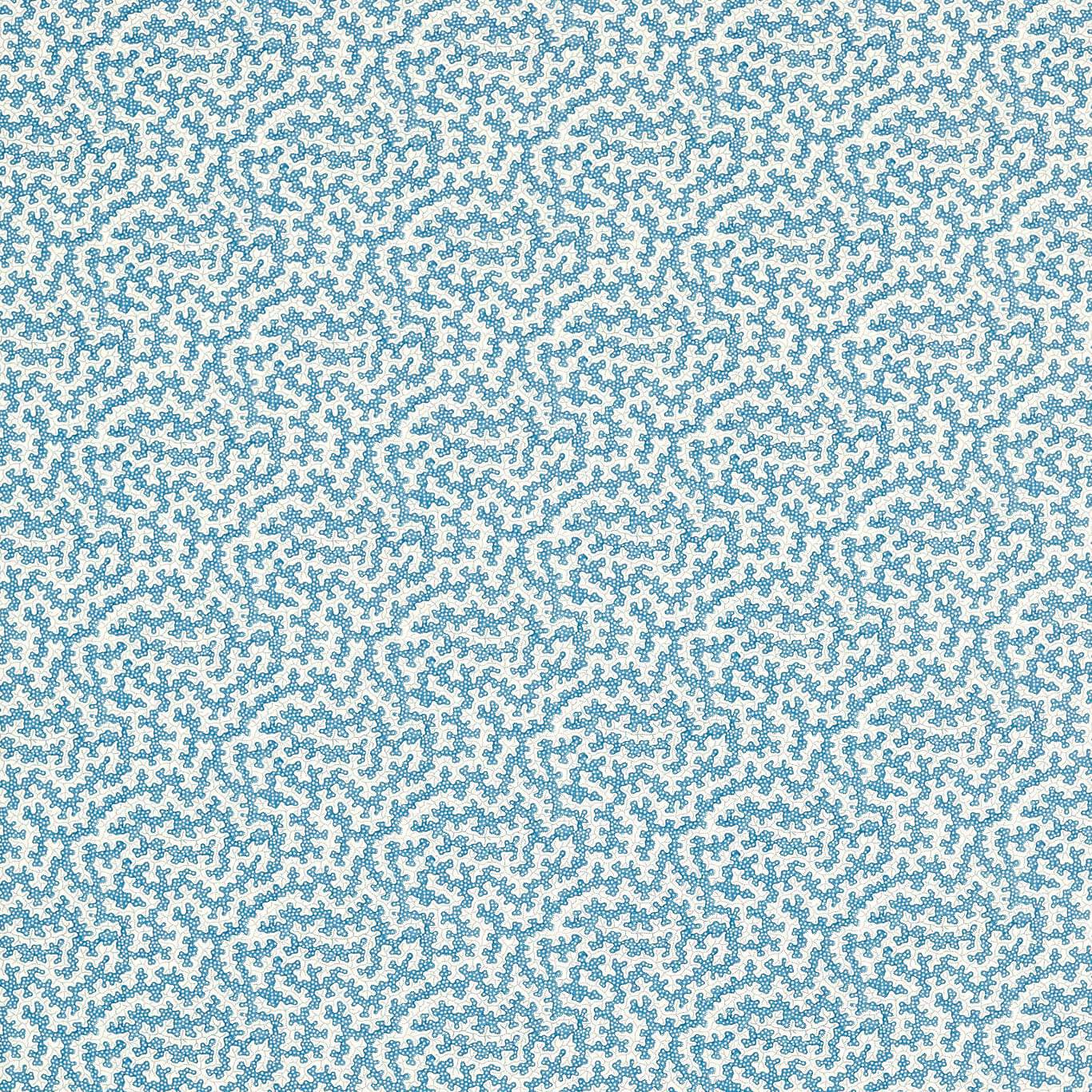 Cream background with dense blue speckled abstract pattern, small dotted motif for textiles or wallpaper.