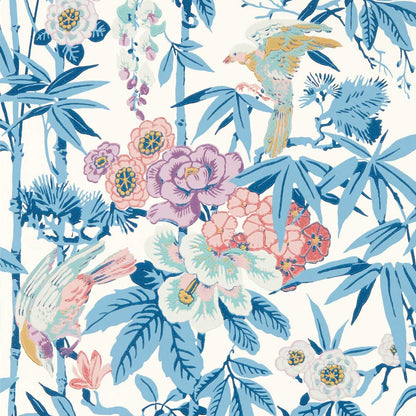 Luxury chinoiserie botanical wallpaper in China Blue and Lotus Pink by Sanderson Design Group featuring striped bamboo, exotic birds, hibiscus flowers, hydrangea blooms, and cascading wisteria. Vintage-inspired floral wallpaper ideal for bedrooms, dining rooms, powder rooms, cottagecore homes, grandmillennial interiors, and elegant statement walls.