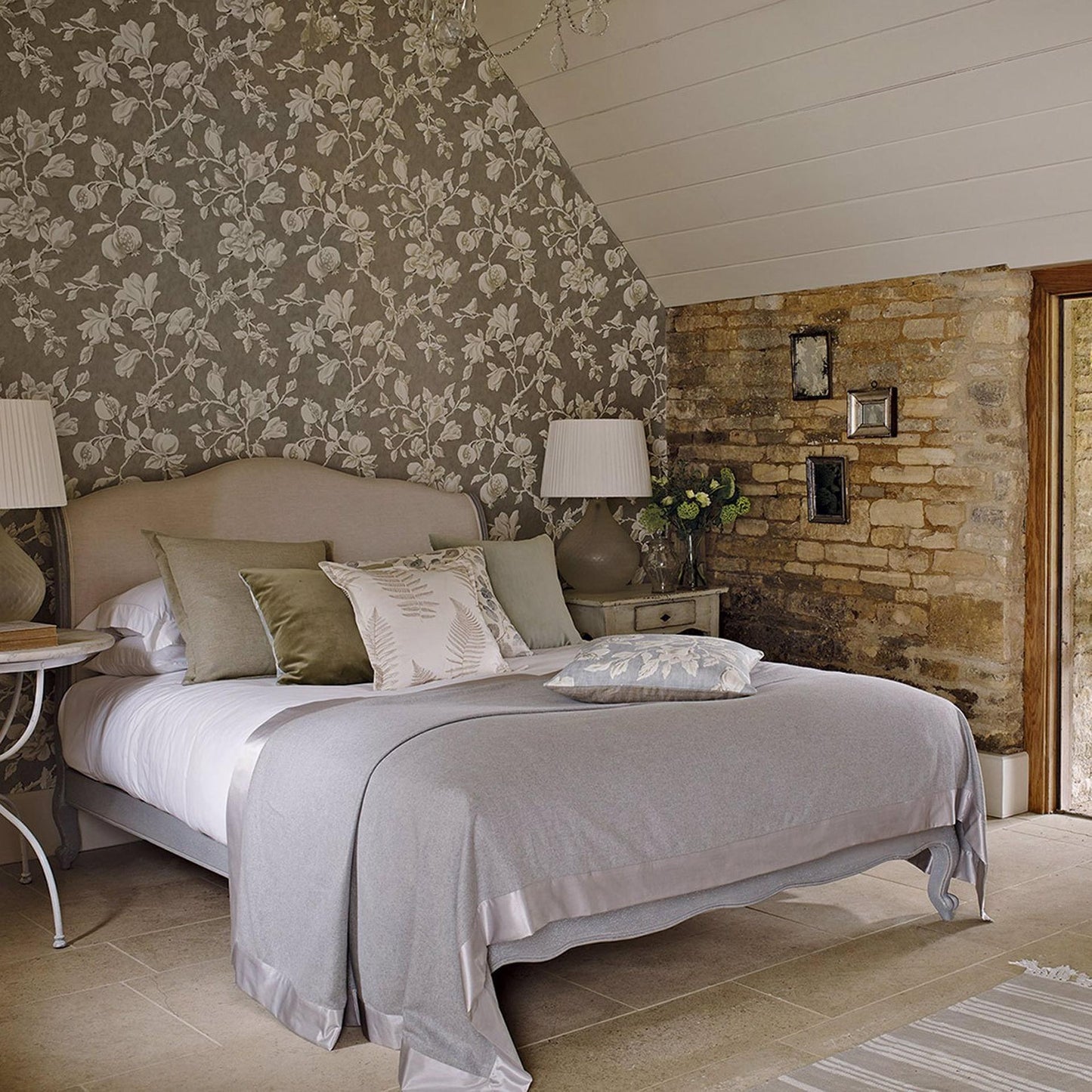 Sanderson Magnolia & Pomegranate Wallpaper in Silver/Linen (DWOW215722) showcasing large-scale magnolia and pomegranate trail design with birds on textured background — perfect for a sophisticated accent wall