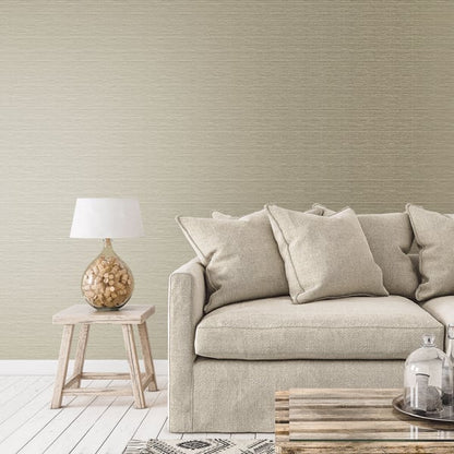 Gold metallic plain wallpaper on the wall in a neutral-toned room.