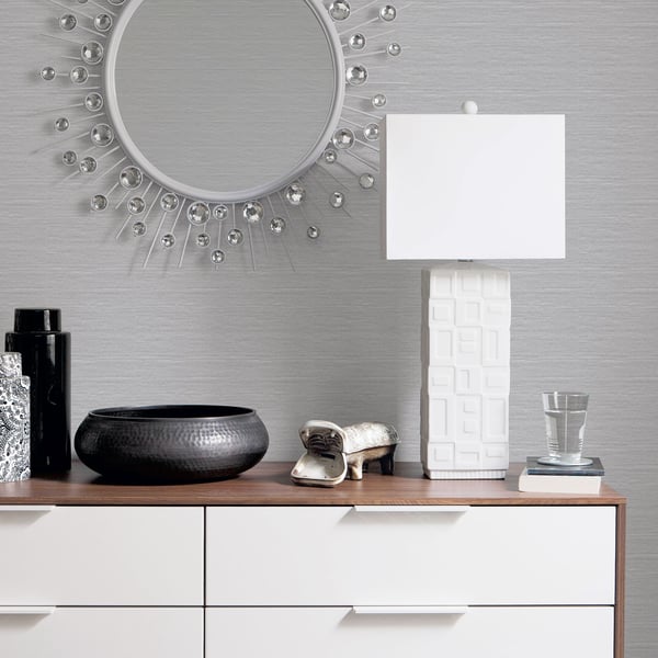 Metallic silver-grey plain wallpaper sample.
