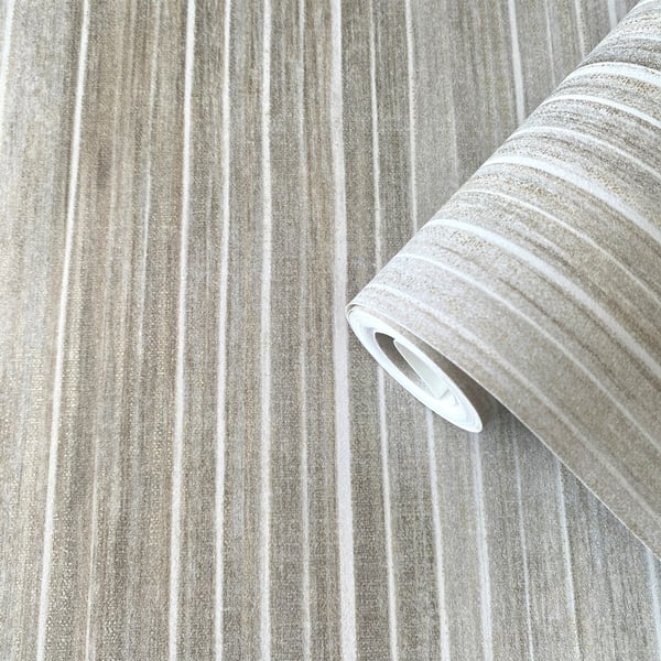 Silver grey vertical stripe wallpaper roll with a textured finish; white core visible along the roll edge.