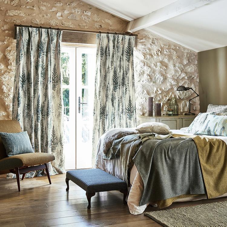 Sanderson Elysian Fabric showing soft printed linen with a painterly landscape of rolling hills and meadows in subtle natural tones — ideal for drapery and upholstery.