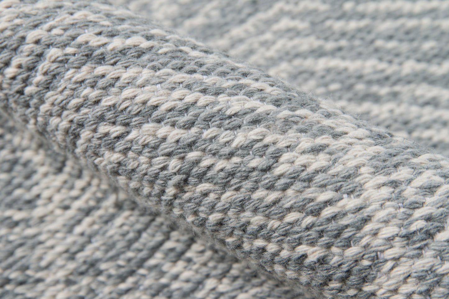 Close-up of chunky heather gray-blue rug fibers creating a textured surface (4' x 6' rug).