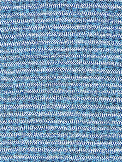 Blue denim-like woven fabric close-up with tight weave and subtle white flecks
