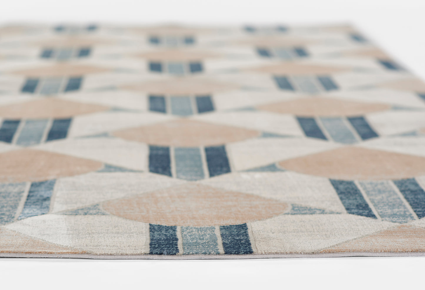 Beige geometric rug with navy blue diamond and stripe motif for modern decor