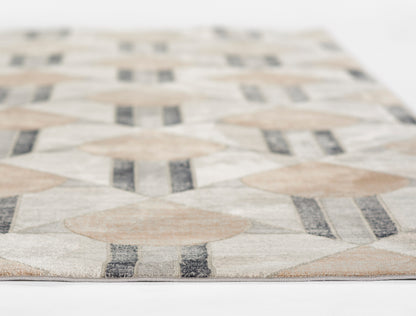 Close-up of a beige, cream and gray geometric rug with diamond motifs and striped accents, woven texture.