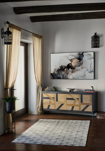 Rustic metal-framed console with chevron wood doors, in a bright living room with beige curtains, abstract wall art and a rug