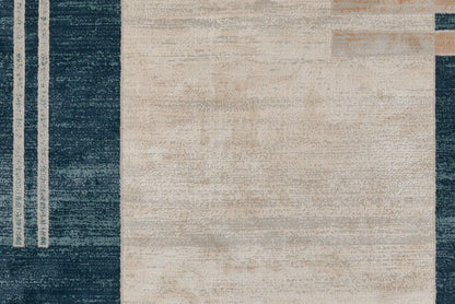 Modern abstract rug with navy blue borders, cream central field, and beige geometric accents; woven texture.