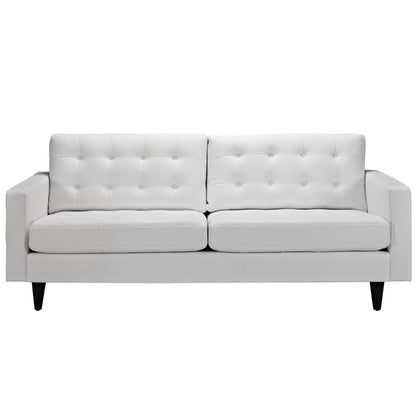 White bonded leather sofa with two seat cushions, buttoned back cushions, rectangular arms and dark tapered legs.