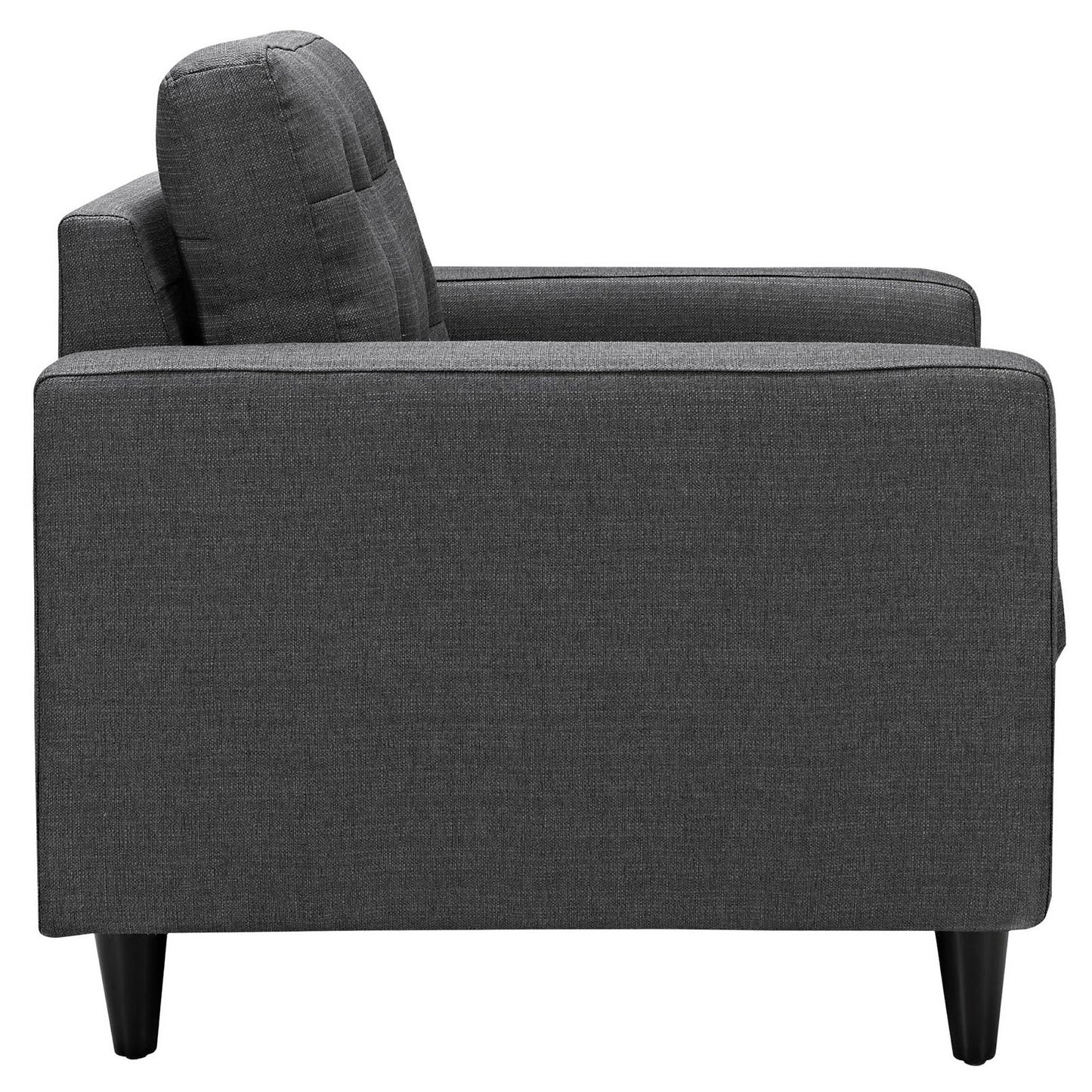 Dark gray fabric upholstered modern armchair with square arms, tall back cushion and black tapered legs.