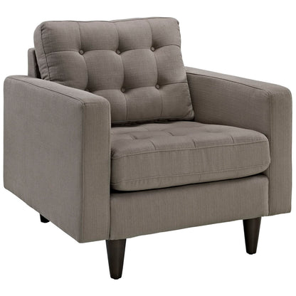 Gray textured fabric tufted armchair with square arms, cushioned seat and back, dark tapered legs.