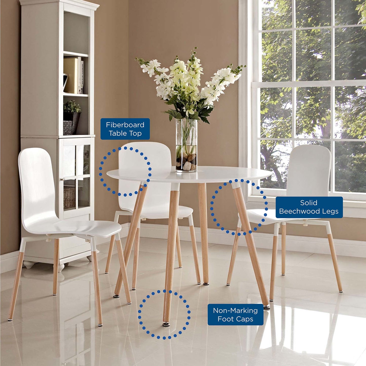 Round white dining table with fiberboard top and solid beechwood legs; white molded chairs and non-marking foot caps.