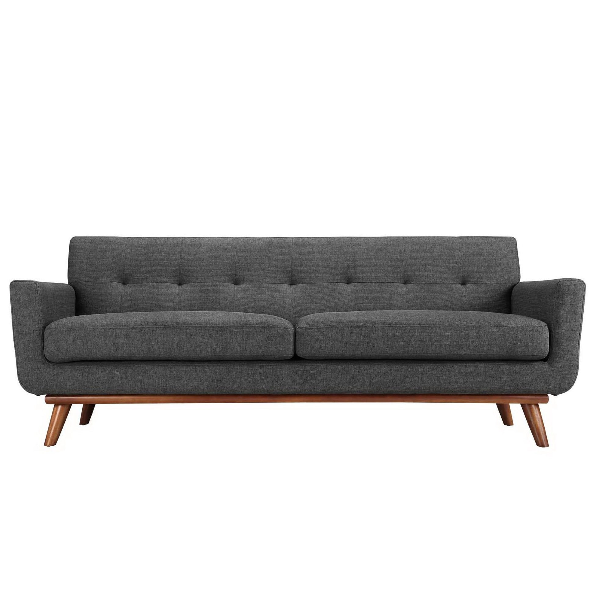 Dark gray mid-century fabric sofa with tufted back, two cushioned seats, and angled wooden legs.