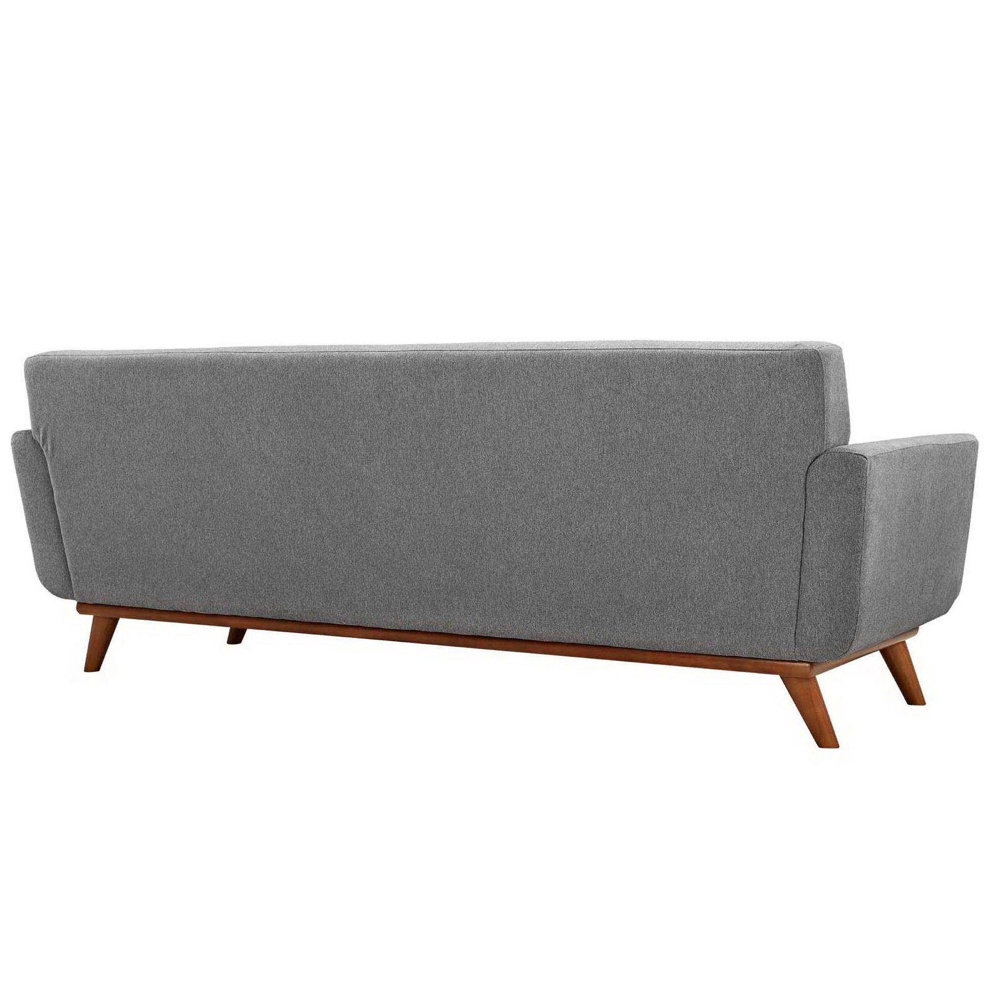 Grey fabric sofa with angled wooden legs; mid-century modern style.