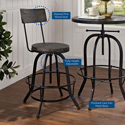 Industrial black bar stool: stained pine wood seat, polished cast iron base, fully adjustable height, with round footrest.