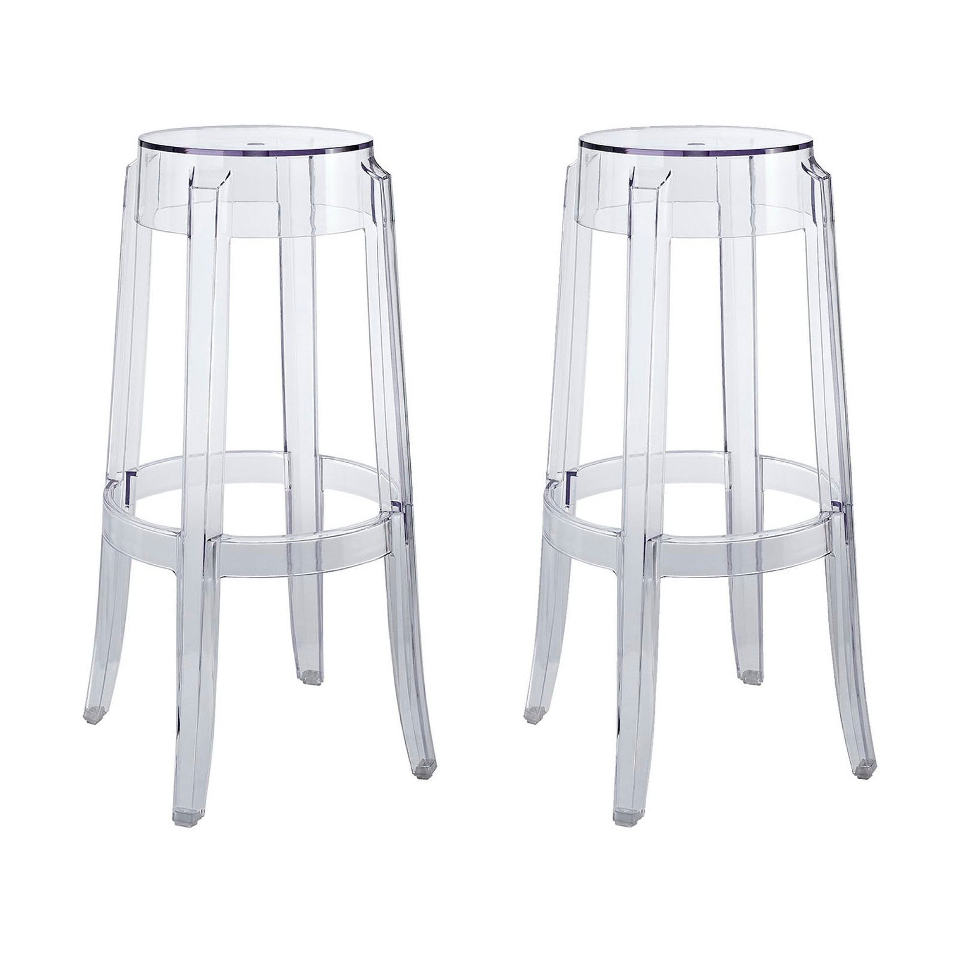 Pair of clear acrylic bar stools with round seats, four slender legs, and circular footrests.