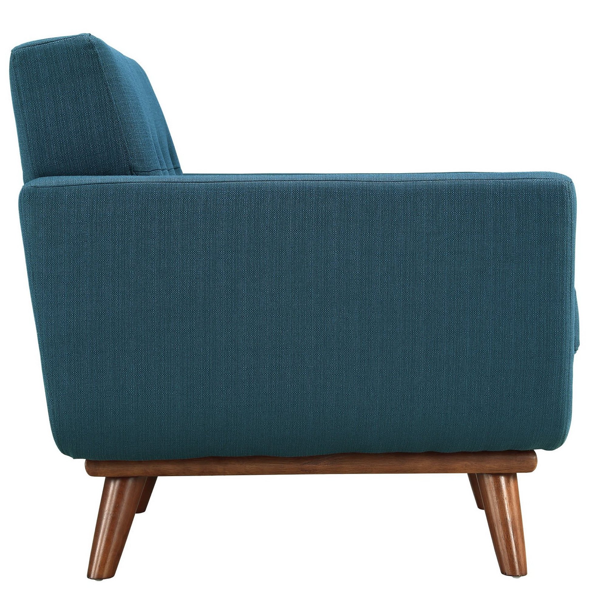 Teal fabric mid-century armchair with tapered wooden legs; side view shows cushioned back and boxy, compact shape.