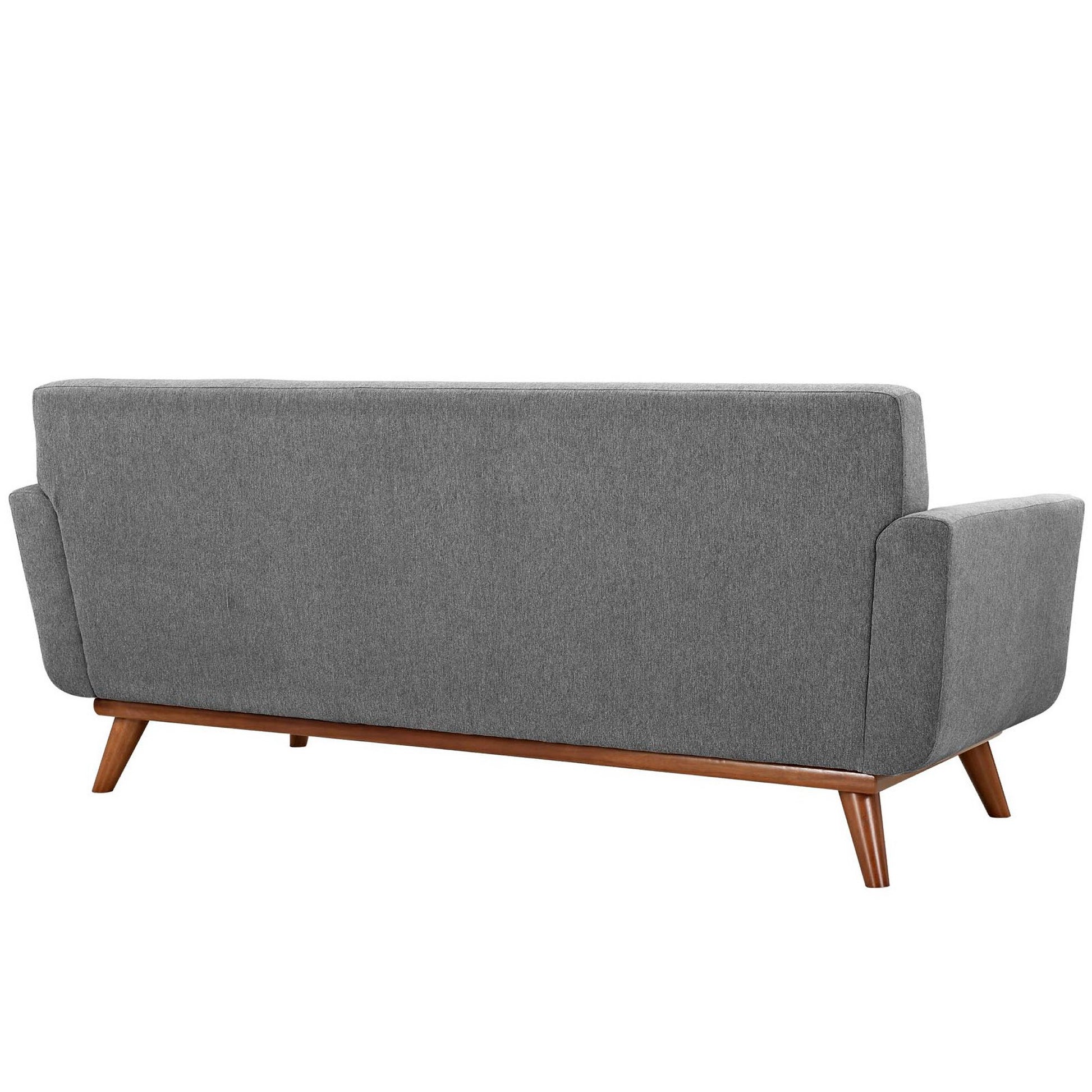 Gray fabric mid-century modern sofa with wooden angled legs, shown from the back.