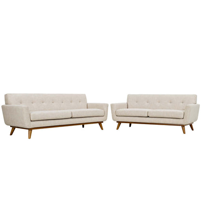 Pair of brown button-tufted mid-century modern sofas with wooden tapered legs; loveseat and sofa set.