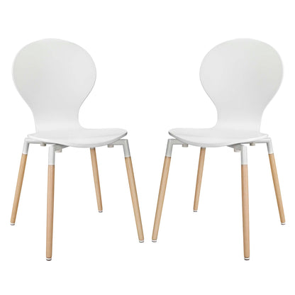 Pair of white molded plastic dining chairs with natural wood legs and metal supports, mid-century modern style.