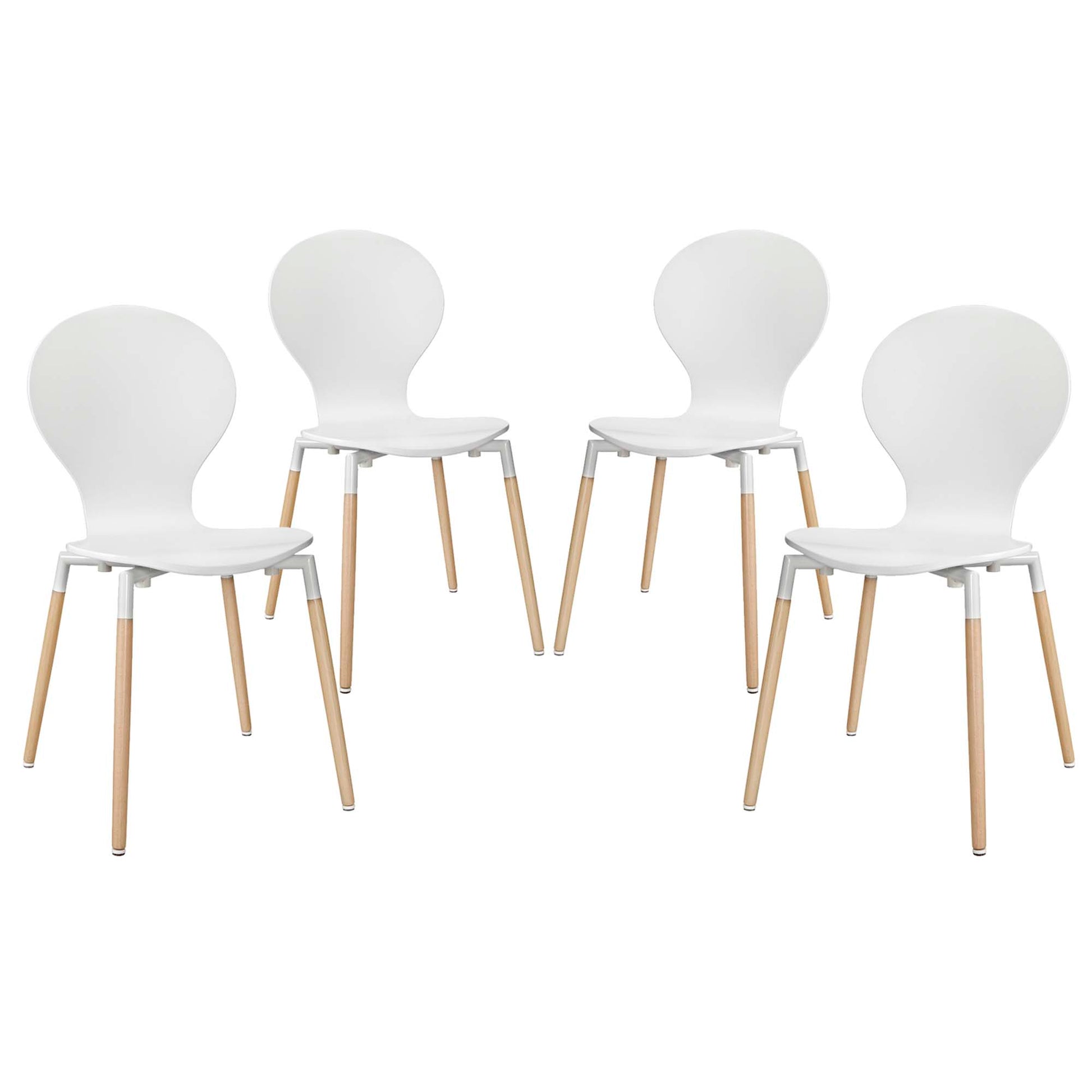 Four white molded plastic chairs with light wood legs, mid-century modern dining set.