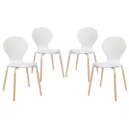 Four white molded plastic chairs with light wood legs, mid-century modern dining set.