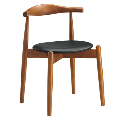 Mid-century walnut dining chair with black round padded seat, curved backrest and tapered legs.