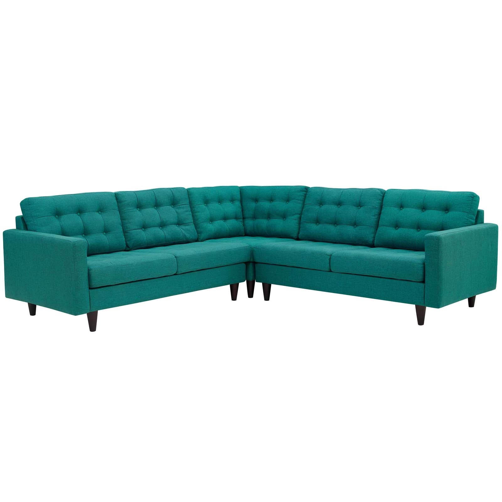Teal velvet L-shaped sectional sofa with tufted back cushions and dark tapered wood legs.