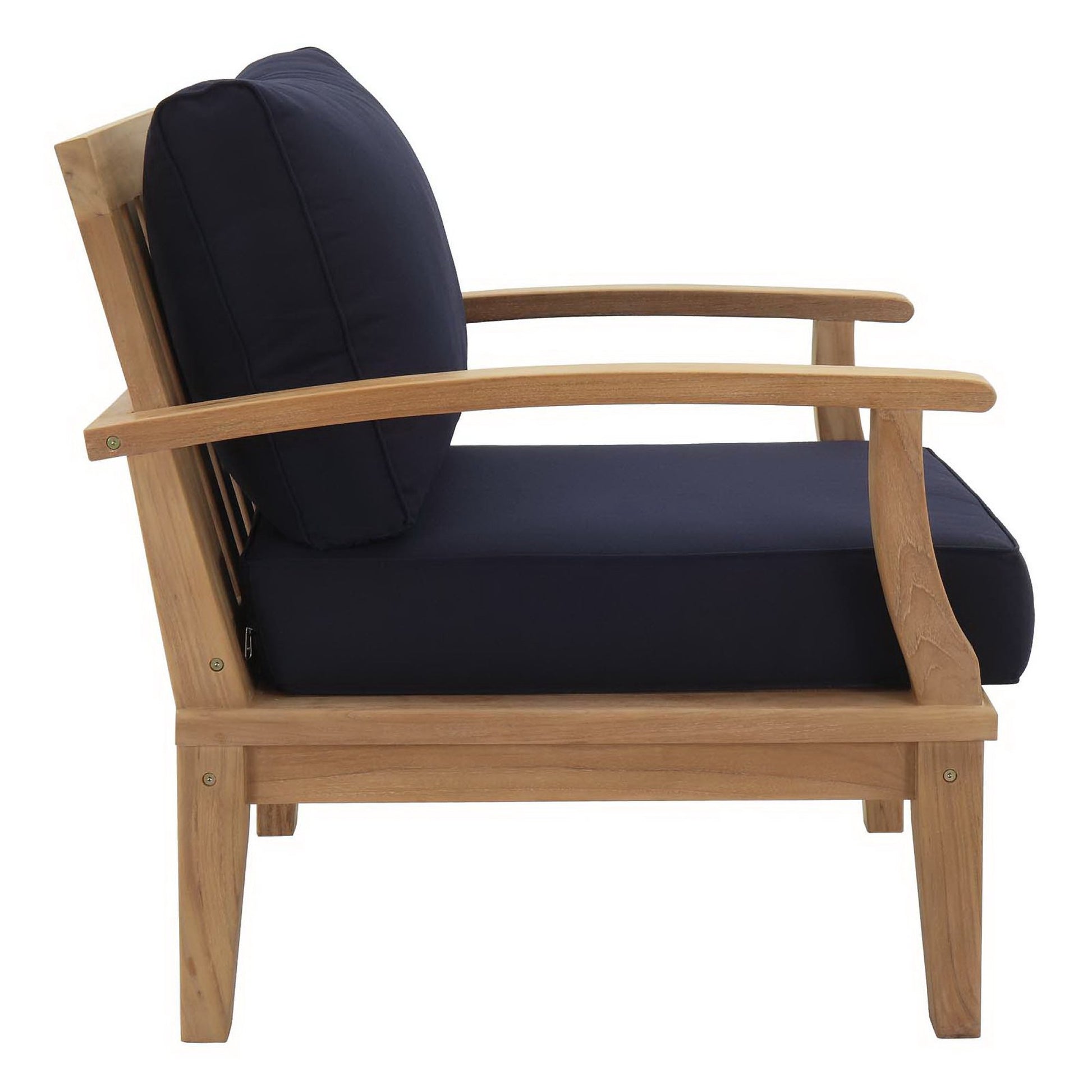Natural wood outdoor armchair with navy cushions, curved arms and a matching back pillow.