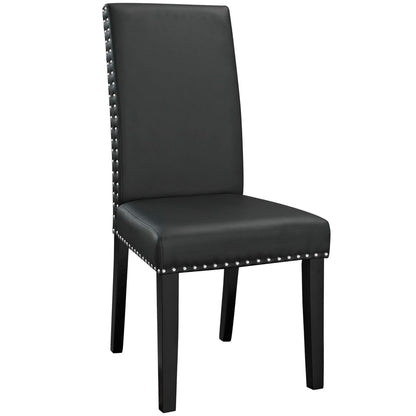 Black faux-leather dining chair with tall back, square legs, and studded nailhead trim.