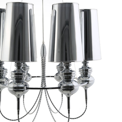 Stainless steel chandelier with cylindrical metal shades and glossy stacked stems, modern glam lighting.