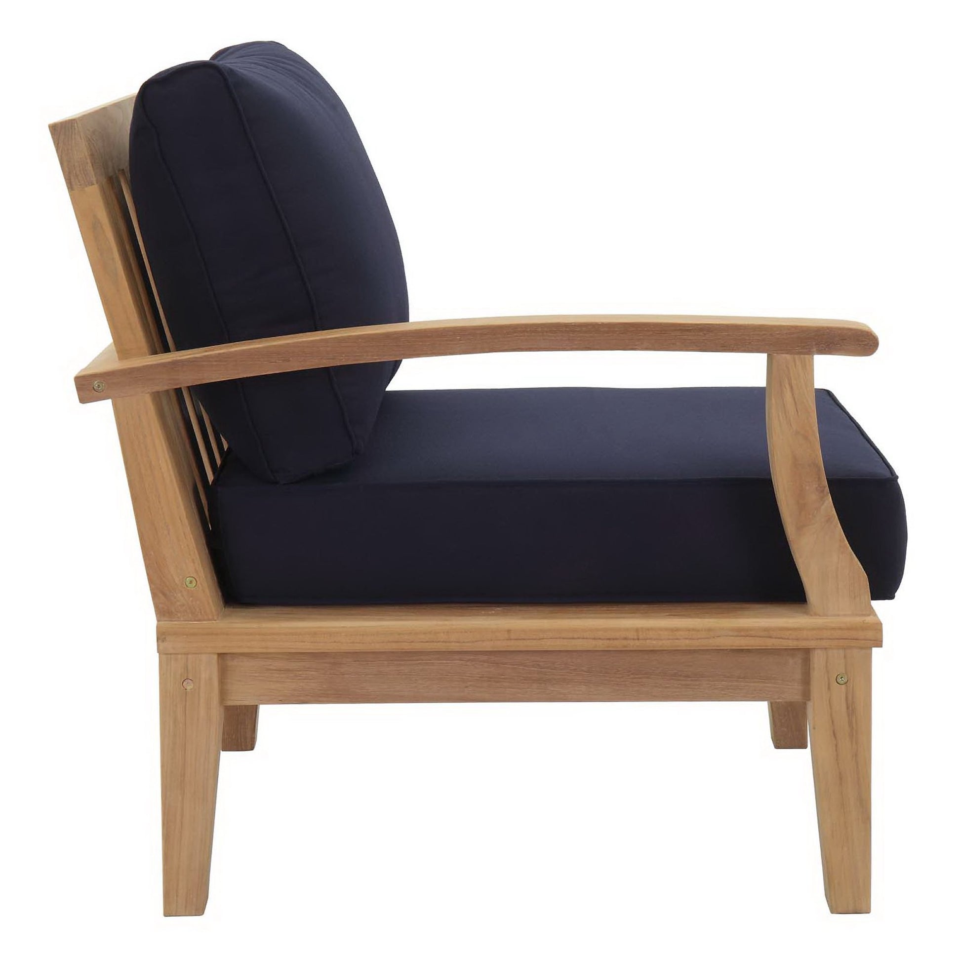 Natural wood armchair with navy cushions; curved arms, slatted back, thick navy seat cushion and matching back pillow.