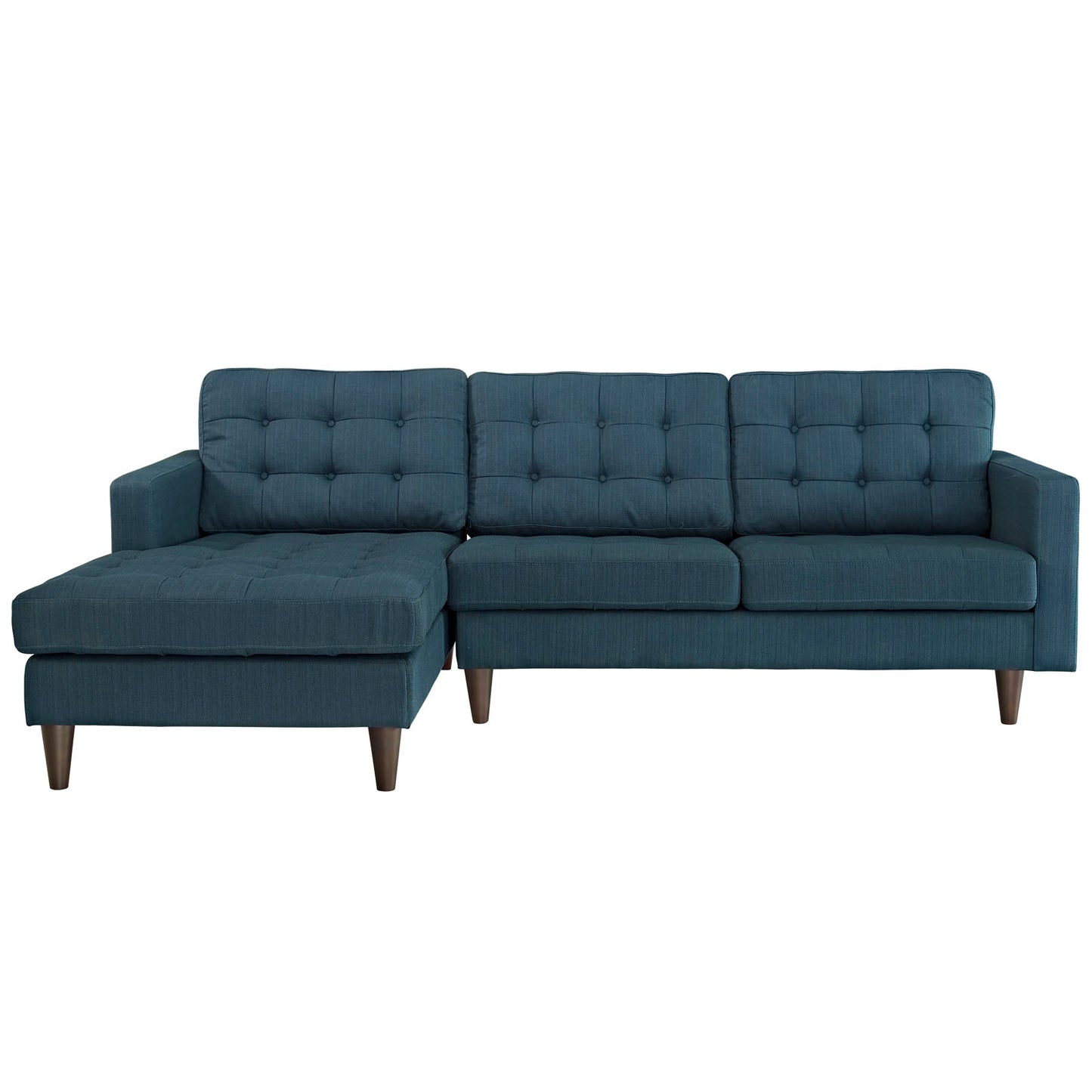 Teal-blue L-shaped sectional sofa with chaise, tufted back cushions, and tapered wooden legs.