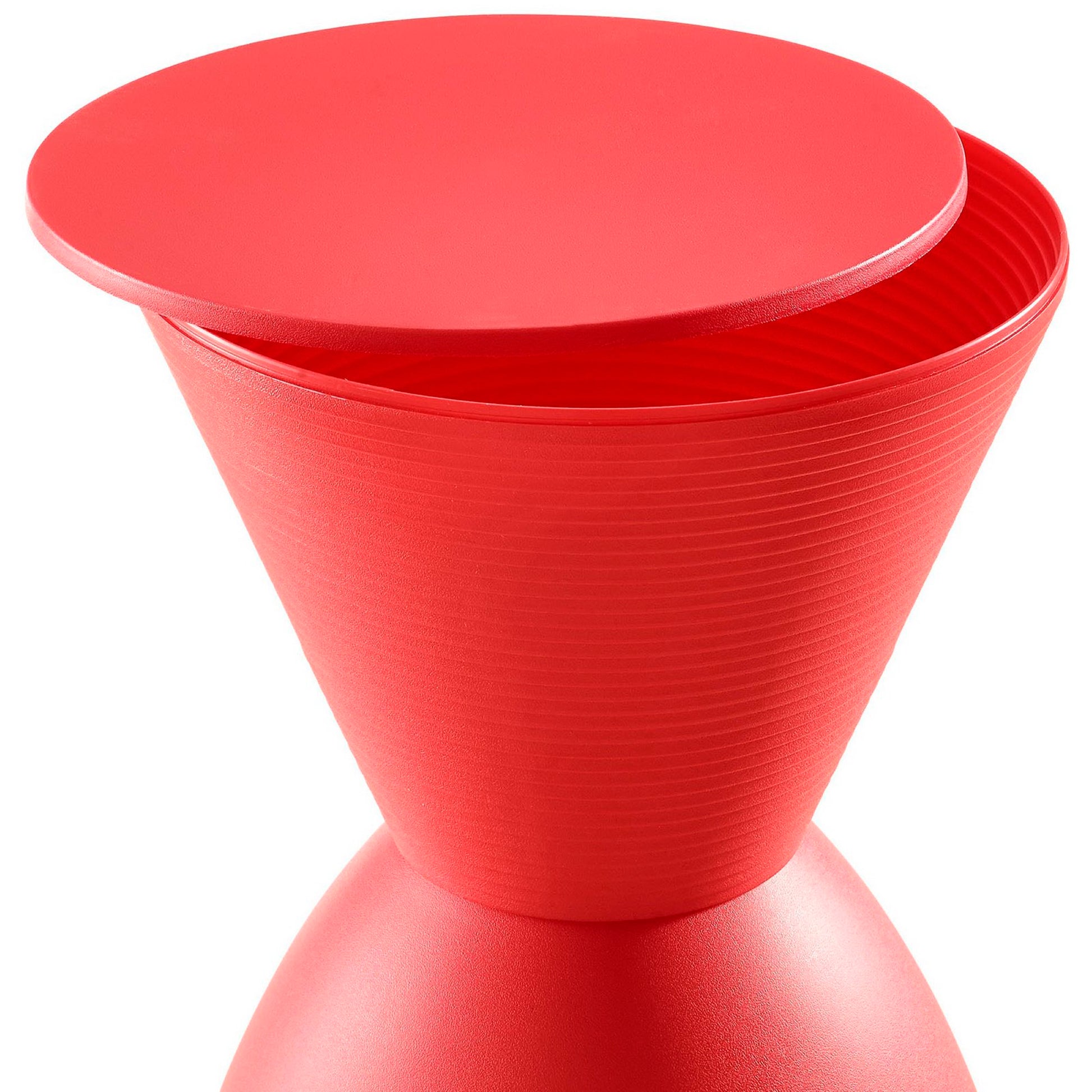 Red plastic hourglass-shaped container with ridged sides and flat removable lid.