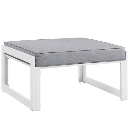 White-framed outdoor patio sectional sofa set with grey cushions.