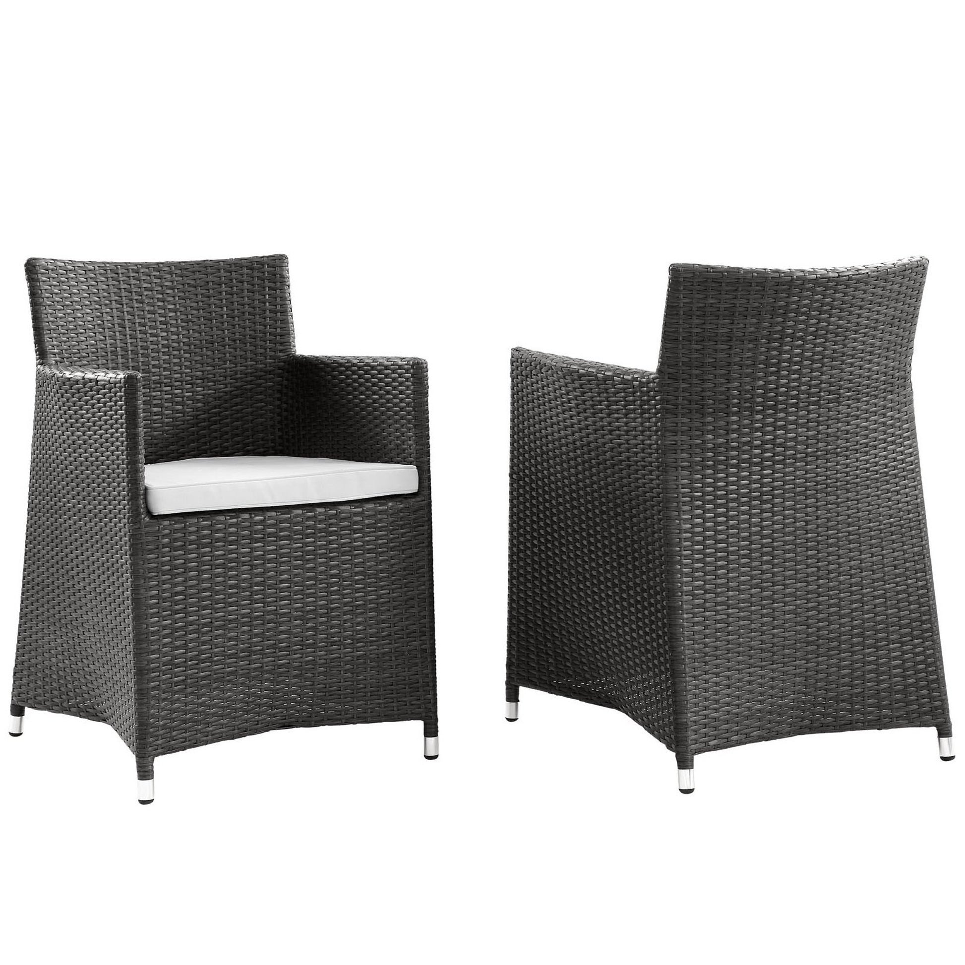 Pair of dark brown wicker outdoor armchairs with white cushions for patio use.