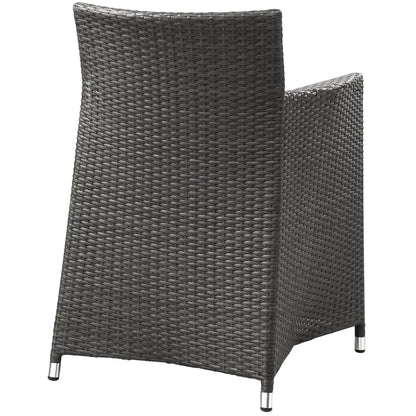 Dark brown woven resin wicker outdoor armchairs with metal feet and high backs; set of 2.