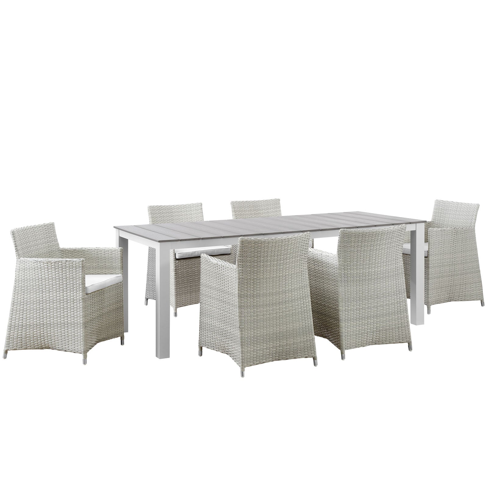 Outdoor dining set: rectangular gray slatted table with white frame, surrounded by light gray wicker chairs with white cushions.